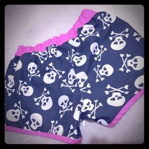 Pink and black skull shorts